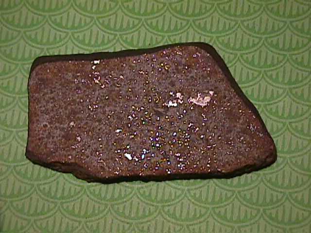 Meteorites are not white or whitish, certainly on the exterior