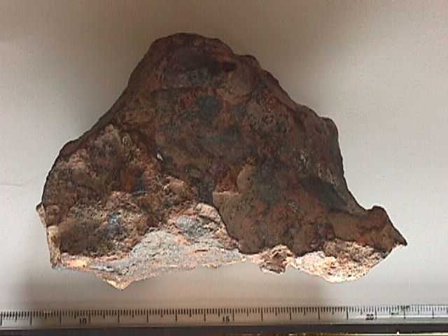 Meteorites are not white or whitish, certainly on the exterior