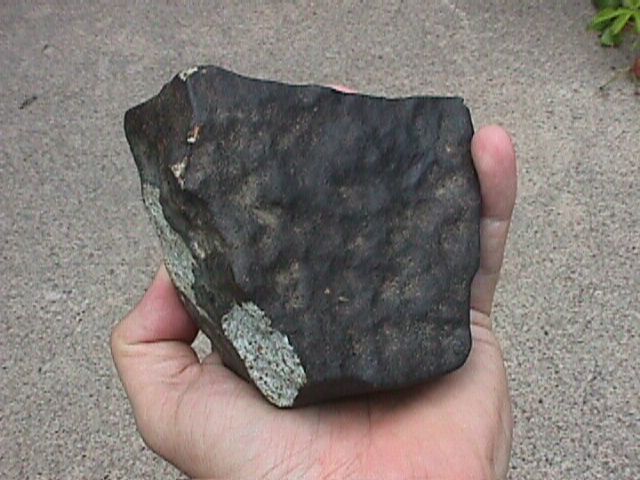 Meteorites are not white or whitish, certainly on the exterior, Some  Meteorite Information